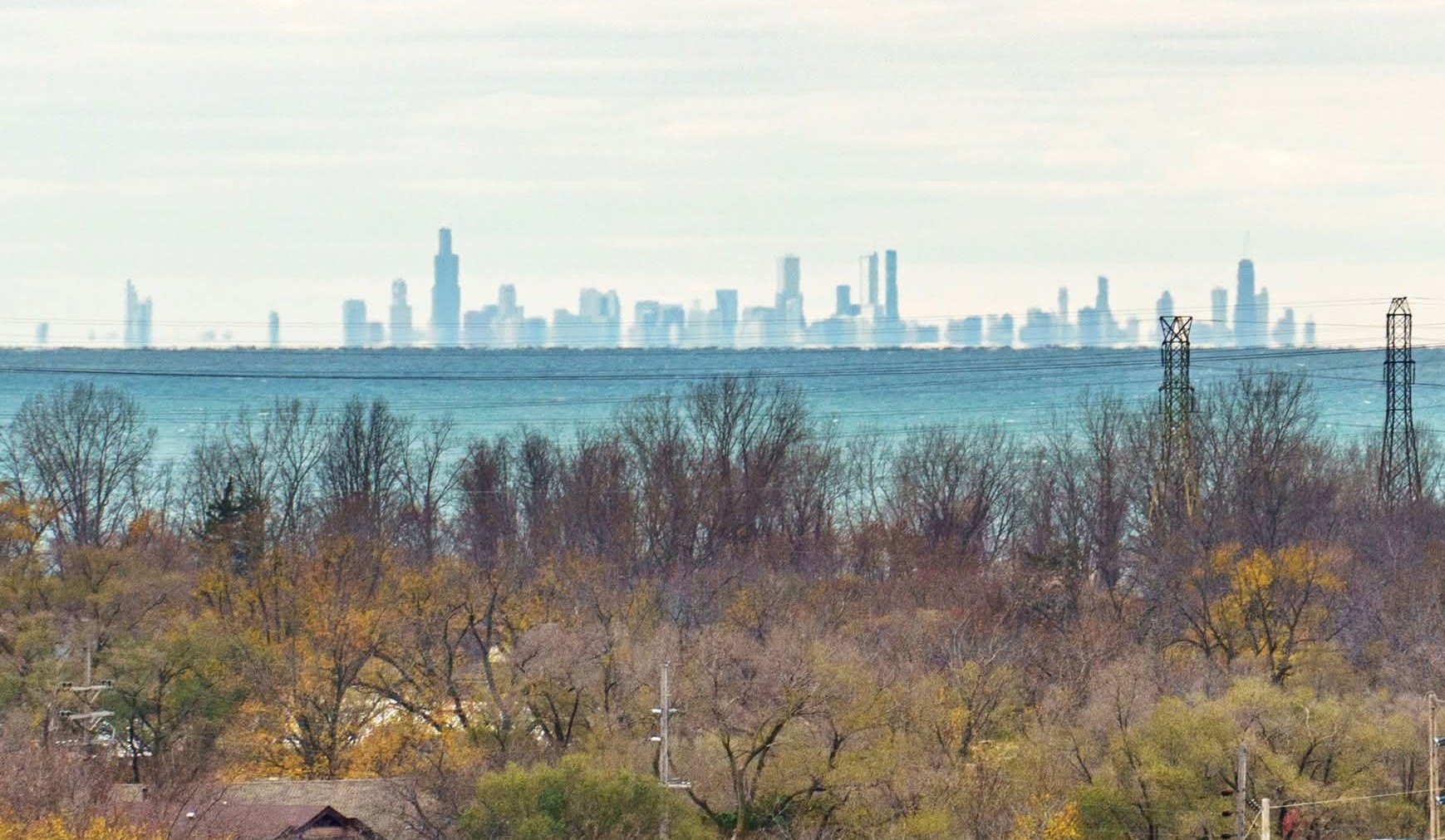 The Chicago skyline across Lake Michigan at sunset